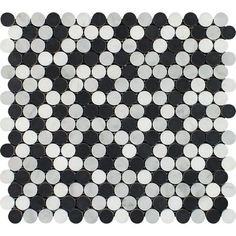 a black and white tile with circles on it