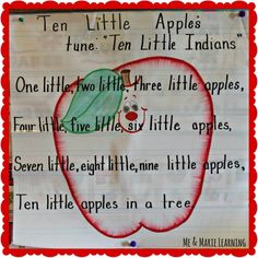 a piece of paper that has an apple on it with words written in red and green