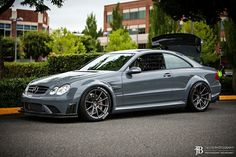 a mercedes cls is parked on the street