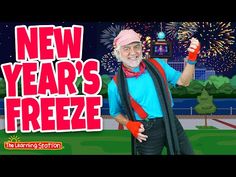 an old man is holding up his new year's freebiee game with fireworks in the background