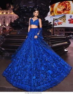 Bollywood Replica LehengaBollywood Model Royal blue georgette wedding lehengaLehenga in Faux Georgette with Sequence and Thread Work as Semi-Stitched with 3.4 Mtrs with Can-Can with Canvas.Choli in Faux Georgette with Micro Inner and Sequence with Thread Work as Un-Stitched.Dupatta in Butterfly Net with Sequance and Thread with Four Side Cut Lace BorderShipping time is 5-7 days.Buy this Lehenga at Kollybollyethnics and make your occasion very special !!. With Express Free Shipping and Custom Stitching, Shop Bollywood Model Royal blue georgette wedding lehenga online at kollybollyethnics from India with free worldwide shipping. Royal Blue Lehenga, Seema Gujral, Haldi Outfits, Butterfly Net, Mehendi Outfits, Party Wear Lehenga Choli, Blue Lehenga, Wedding Saree Indian, Party Wear Lehenga