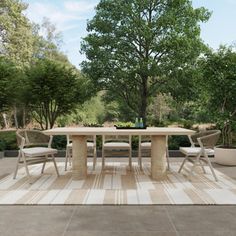 Combining a dimensional ridged effect and sandy beige finish, this dining table brings an airy, modern vibe to any outdoor setting. Seat up to eight around this spacious piece, while enjoying the durability and elegance of marble on concrete. Classic Home Classic Home Aiden Dining Table - Tables in Beige | Size 87" H X 30" W X 41" L | Perigold Backyard Goals, Concrete Dining Table, Classic Home, Outdoor Dining Furniture, Outdoor Store, Outdoor Setting, Modern Vibe, Classic House, Outdoor Dining Table