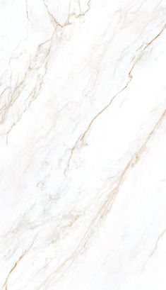 a white marble textured surface with gold veining