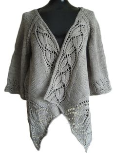 an open knit cardigan sweater on a mannequin