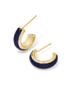 Amp up your earring game with the Ainsley Gold Huggie Earrings in Navy Enamel. The minimal huggie style goes bold with hand-painted enamel embellishments, and the sides feature our signature hoofprint detailing for added texture. Lightweight enough for all-day wear, this pair will take any look from everyday to occasion ready. Metal 14k Yellow Gold Over Brass Material Navy Enamel Closure Ear Post Size 0.59"L X 0.56"W StationDue to the one-of-a-kind nature of the medium, exact colors and patterns Navy Blue Jewelry, Hoof Print, Gold Huggie Earrings, Huggie Earrings Gold, Solitaire Necklaces, Blue Jewelry, Huggie Earrings, Earring Sale, Brass Material