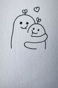 a drawing of two people hugging each other with hearts flying above their heads on the wall