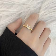 This dainty butterfly ring features a delicate design with sparkling diamonds or crystals, perfect for a minimalist look. An ideal promise ring or thoughtful gift for best friends, celebrating love and friendship. Dainty Design: Elegantly minimalistic, making it suitable for everyday wear or special occasions. Quality Materials: Crafted with diamonds or crystals for a sparkling, luxurious finish. Symbol of Friendship: A beautiful representation of love and connection, ideal for gifting to best f Minimalist Butterfly Ring As A Gift, Dainty Round Butterfly Ring For Gift, Minimalist Butterfly Ring For Gift, Delicate Gold Butterfly Ring Gift, Butterfly-shaped Diamond Accents Ring As Gift, Customer Gifts, Friendship Symbols, Friendship Rings, Diamond Promise Rings