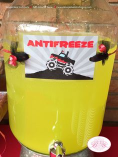 there is a large yellow container with a sticker on it that says antfreeze