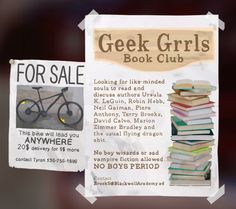 a sign that has been placed next to a pile of books and a bike for sale