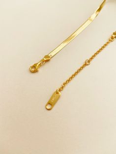 LONG LASTING AND DURABLE FREE SHIPPING ON ALL U.S ORDERS SAFE AND SECURE ONLINE SHOPPING MATERIALS: - Thick 18k gold layer on 925 sterling silver DETAILS: - Length: 16" - Width: 2.5mm - Weight: 5.5-5g CARING INSTRUCTION: **Sterling Silver is a very soft material which can be bent easily, a slight bend of the earring needle is considered normal** - Our jewelry are made of sterling silver. It is a metal that is very soft and tarnishes very easily. It is the natural characteristic of the metal. If Gold Sterling Silver Box Chain Bracelet, Adjustable Gold Box Chain Necklace, Gold Snake Chain Jewelry With Adjustable Chain, Minimalist Gold-plated Sterling Silver Chain Necklace, Gold Lariat Bracelet For Gift, Gold Bracelet With Adjustable Chain For Anniversary, Classic Gold Lariat Chain Necklace, Minimalist Gold Lariat Jewelry, Elegant Gold Lariat Bracelet