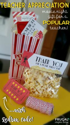 a popcorn box with some tags on it and the words teacher appreciation written in front of it