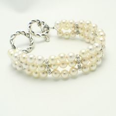 Cream Pearl Multi strand bracelet - Bridal - Formal - Holiday - Swarvoski Pearl - Wedding - Holiday Gift Delicate Oyster Bracelet Jewelry For Wedding, Delicate Wedding Jewelry With Oyster Bracelet, Delicate Oyster Bracelet For Weddings, Pearl White Bracelet For Wedding, Elegant Oyster Cuff Bracelet, Elegant White Round Cuff Bracelet, Round Pearl Beaded Bracelets For Wedding, Pearl Beaded Bracelets For Wedding, Adjustable Pearl Embellished Bracelet For Wedding