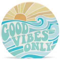 a wooden sign with the words good vibes only in front of an ocean wave