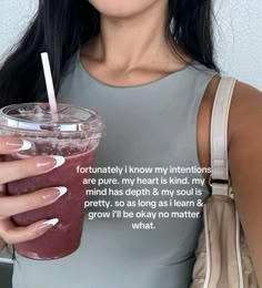 a woman holding a drink with a straw in it's hand and the caption says, i don't know what