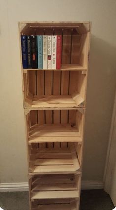 the bookshelf is made out of pallet wood