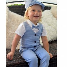 This stunning boy suit is very well designed and handcrafted in Europe. Available in light blue and grey. The set includes five pieces: vest, pants, dress shirt, hat and bow tie. *vest and pants made of cozy, soft fabric *pants with elastic waist *white dress shirt with collar, buttons on the front and metallic snaps on the crotch *available in sizes 3 months - 12 month only This suit will be fit perfect for baptism, first birthday, little groomsman, ring's bearer, christening, wedding or a birt Toddler Boy Easter Outfit, Wedding Kids Outfit, Toddler Boy Easter, Blue Tux, Wedding Outfit For Boys, Light Blue Suit, Tie Vest, Christening Ideas, Boys Easter Outfit