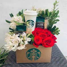 starbucks coffee and red roses in a cardboard box