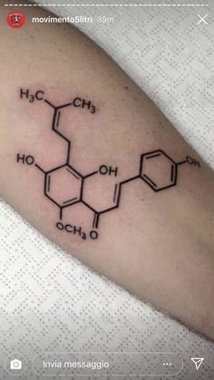 a tattoo on the arm that has some chemical symbols