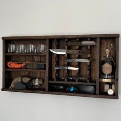 a wooden shelf filled with lots of different items