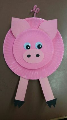 a paper plate with a pig on it