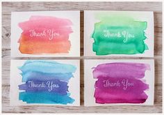 four watercolor cards with the words thank you and thank you written in different colors