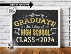 a chalkboard sign that reads i'm officially graduate, and the words high school class