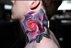 a man with a rose tattoo on his neck