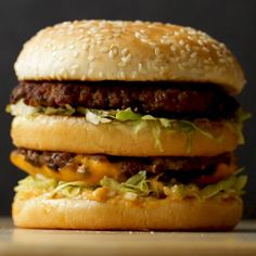 two hamburgers stacked on top of each other