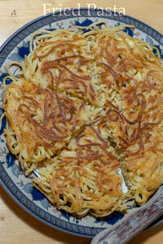 a plate with some noodles on it