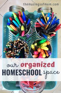 organized homeschool space with pencils and crayons in cups on the tray