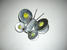 four pieces of metal with yellow lights on them