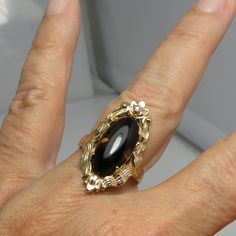 Vintage 10k yellow gold smoky quartz and diamond cocktail ring. 4.8 grams. size 6.5. beautiful detail. 29mm by 19mm. Gold Art Deco Ring With Cabochon, Art Deco Gold Cabochon Ring, Antique Gold Marquise Ring, Antique Marquise Gold Ring, Antique Marquise Collectible Ring, Vintage Yellow Gold Marquise Jewelry, Vintage Marquise Gold Jewelry, Vintage Gold Marquise Jewelry, Antique Marquise Gold Jewelry