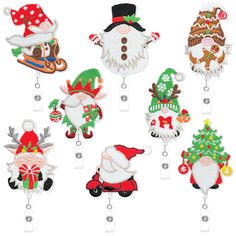 the christmas decorations are hanging from the hooks on the light switch cover, which is decorated with santa claus and other holiday related items