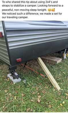 the trailer is parked in the grass with it's front end lifted up and ready to be moved