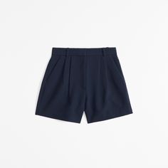 Elevate your wardrobe with the A&F Sloane Tailored Short, a blend of sophistication and comfort. Designed for the modern woman, these shorts offer a chic dark indigo hue that pairs effortlessly with any top.

- Size: 26
- Color: Dark Indigo
- Material: Polyester, Viscose, Elastane
- Gender: Female
- Features: Ultra high rise, figure-flattering pleating, functional fly, pockets, partially elasticated waistband

Crafted from a premium blend of polyester, viscose, and elastane, these shorts ensure Fitted Elastane Shorts With 5-inch Inseam, Fitted Shorts With Pockets And 5-inch Inseam, Pleated Fitted Cotton Shorts, 4-way Stretch Shorts With Pockets And 5-inch Inseam, Cotton Shorts With Welt Pockets And 5-inch Inseam, Dark Indigo, Comfort Design, Tailored Shorts, Tailored Design