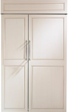 a tall white cabinet with two doors