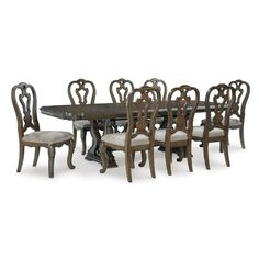 the dining room table and chairs are all made out of wood with white upholstered seats