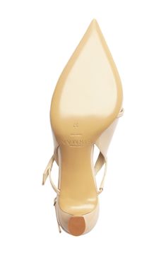 Twin straps crossing the open vamp of this pointy-toe slingback add a modern touch of elegance. A low, sculptural bell heel combines comfort, style and practicality for an effortless day-to-night look. 2 1/4" (60mm) heel Adjustable slingback strap with buckle closure Leather upper, lining and sole Made in Italy Designer Shoes Designer Slingback Pumps With 4-inch Heel And Pointed Toe, Luxury Slingback Kitten Heels With Sculpted Heel, Designer Slingback Pumps With 4-inch Heel, Designer Slingback Heels With Sculpted Heel, Designer Slingback Pumps With Heel Strap, Designer Fitted Slingback Pumps, Evening Slingback Sandals With Sculpted Heel And Almond Toe, Luxury Slingback Pumps With Sculpted Heel, Luxury Slingback Pumps With Single Toe Strap