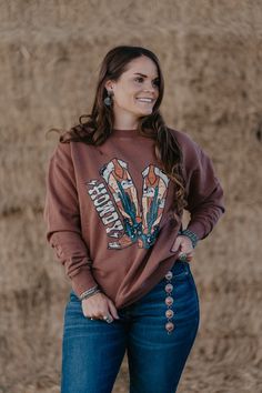 Boot scootin' boogie - this sweatshirt is great all year round with a neutral brown color and adorable graphic. Material: 100% Cotton XS (2/4) | Small (4/6) | Medium (6/8) | Large (10/12) | XL (14/16) | 2XL (18/20) Boot Scootin Boogie, Nfr Style, Authentic Turquoise Jewelry, Graphic Material, Top Graphic Tees, Pet Hair, Turquoise Jewelry, Bottoms Pants, Brown Color