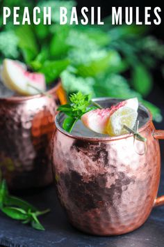 two copper mugs filled with watermelon and mint