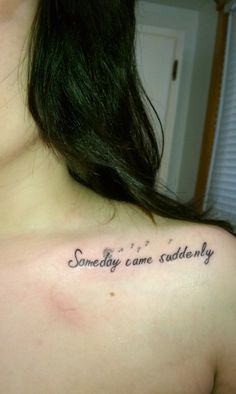 a woman with a tattoo on her chest saying something came suddenly