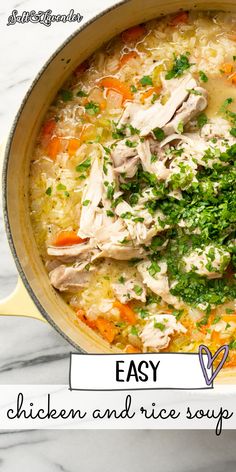 chicken and rice soup with parsley in a yellow pan on a marble countertop