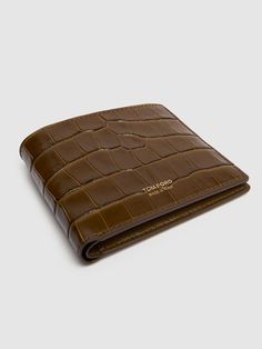 Height: 9.5cm Width: 11.5cm Depth: 1.5cm. Eight internal card slots. One bill compartment. Logo details. All over embosssed pattern placement may vary Tom Ford Men, Sports Sweatshirts, Mens Khakis, Crossbody Messenger Bag, Sports Brands, Bifold Wallet, Lace Up Shoes, Emboss, Loafer Shoes