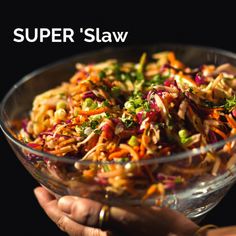 a person holding a glass bowl full of vegetables with the words how to eat 8 serves of vegetables every day