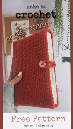 a crochet book cover with a button on the front and an image of a hand holding it