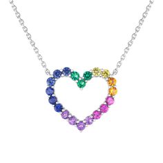 Beautiful in meaning and appearance, celebrate the colorful wonder of rainbows with this sterling silver necklace. This stunning necklace boasts a heart shaped stationary pendant that is lined with round gemstones in a rainbow of vibrant hues. The gemstones include created blue, yellow, and orange sapphire, amethyst, created ruby, and created emerald. This heart pendant measures 16mm in both length and width and is set on a cable chain that can be worn at 16 or 18 inches in length. Rainbow Heart Charm Jewelry For Valentine's Day, Rainbow Multi-stone Necklace In Fine Jewelry Style, Elegant Multicolor Heart Cut Jewelry, Multicolor Heart Cut Multi-stone Jewelry, Rainbow Necklace With Heart Charm As Gift, Elegant Rainbow Pendant Necklaces, Rainbow Heart Pendant Jewelry Gift, Multicolor Heart-shaped Sterling Silver Necklace, Valentine's Day Multicolor Pendant Jewelry