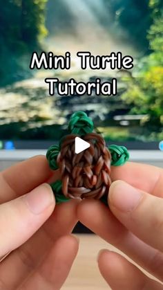 someone is holding a miniature turtle made out of crochet and yarn with the words mini turtle tutorial written on it