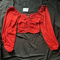 Perfect For Under A Jacket For Your Night Out. Forever 21 Long Sleeve Crop Top Size M. 66% Polyester. 34% Cotton. Has Stretch To It Sleeve Length Is Approx 28” Body Length Is Approx 10.5” Forever 21 Long Sleeve Crop Top For Day Out, Forever 21 Trendy Red Crop Top, Trendy Red Forever 21 Crop Top, Casual Crop Top For Date Night, Forever 21 Trendy Long Sleeve Crop Top, Trendy Forever 21 Long Sleeve Crop Top, Trendy Long Sleeve Crop Top By Forever 21, Red Forever 21 Top For Night Out, Casual Stretch Crop Top For Date Night