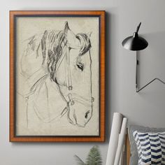 a drawing of a horse is hanging on the wall