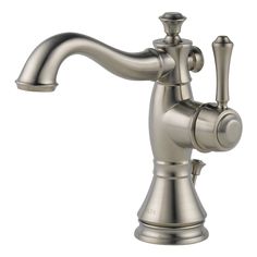 an antique style faucet with chrome finish